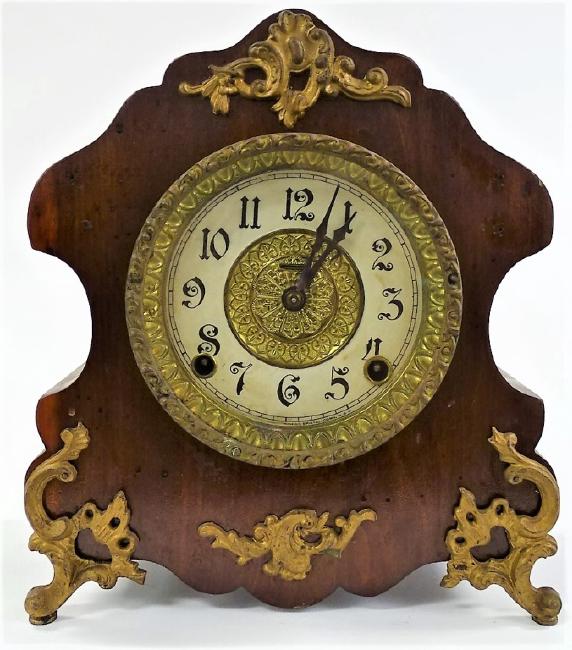 Late 19th century burled Mahogany case mantel clock by Elias Ingraham Clock Co