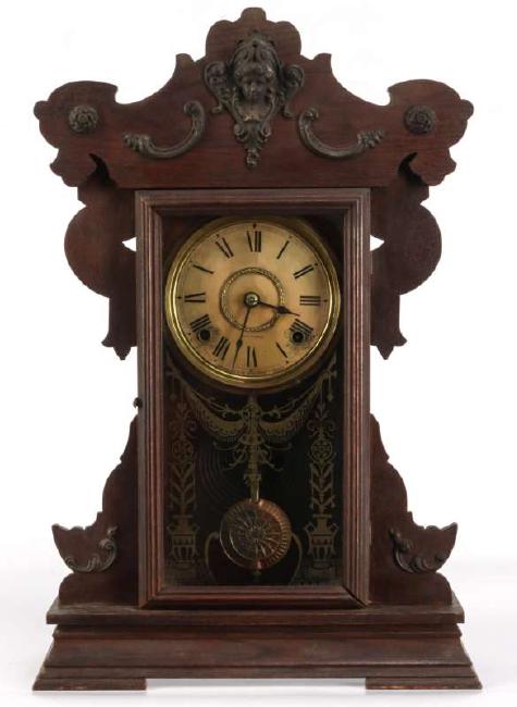 A SETH THOMAS METAL NO. 1118  KITCHEN CLOCK