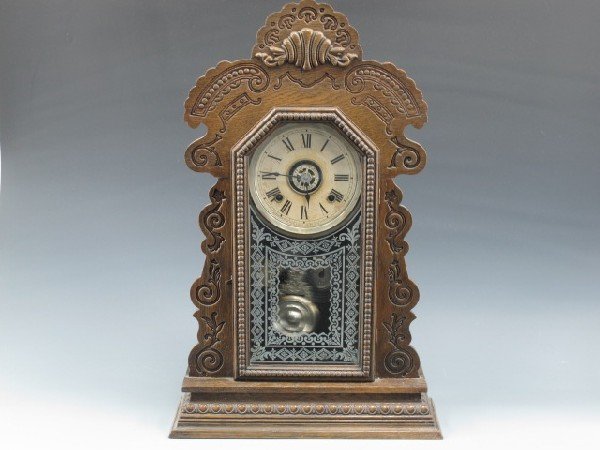 AN ANSONIA KENSICO GINGERBREAD KITCHEN CLOCK