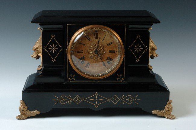 AN ANSONIA ‘PALERMO’ METAL MANTEL CLOCK
