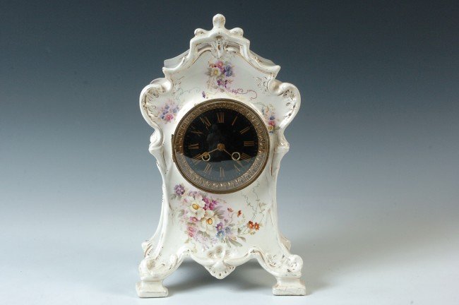 A NICE CHINA CASE CLOCK WITH FRENCH MOVEMENT