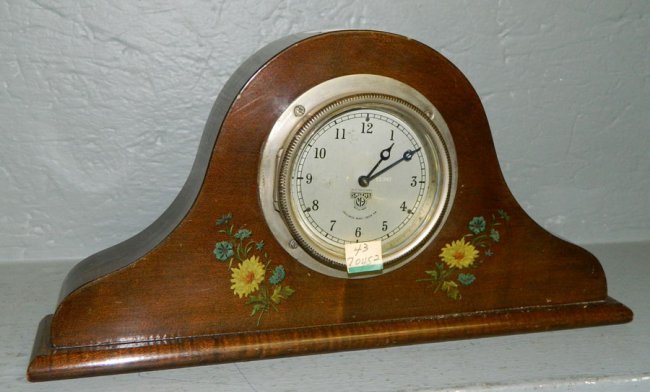 8 day maple swinging works clock w/floral detail