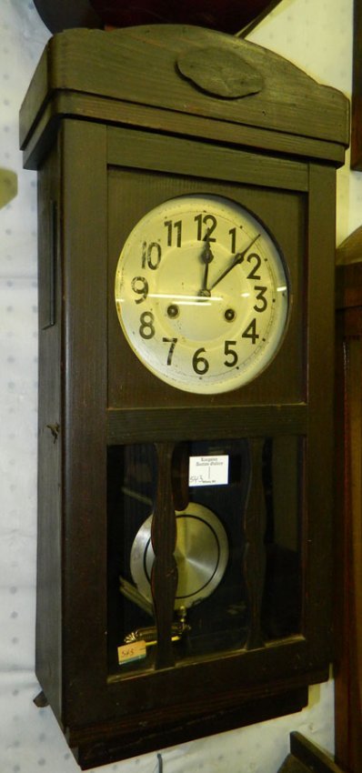 8 day wall clock w/glass panels & silver dial.