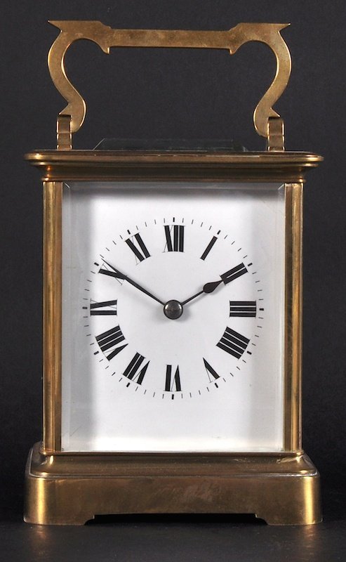 A LARGE 19TH CENTURY FRENCH BRASS CARRIAGE/TABLE CLOCK.