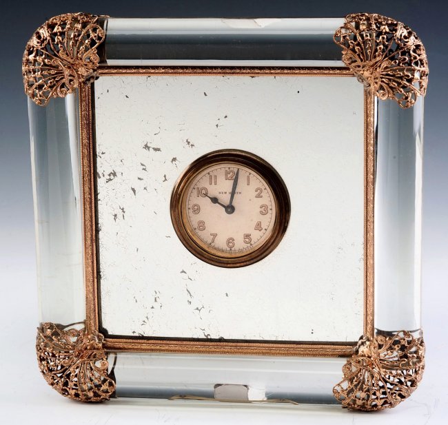 A VINTAGE NEW HAVEN GLASS TUBE MIRROR CLOCK