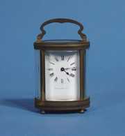 Small Brass Oval Carriage Shelf Clock