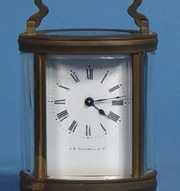 Small Brass Oval Carriage Shelf Clock