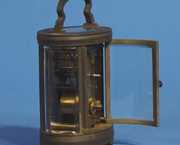Small Brass Oval Carriage Shelf Clock