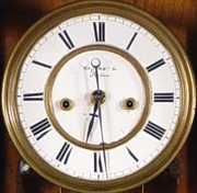 Mini WT DRVN Serpentine Regulator Wall Clock