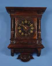 Carved Oak Wall Clock