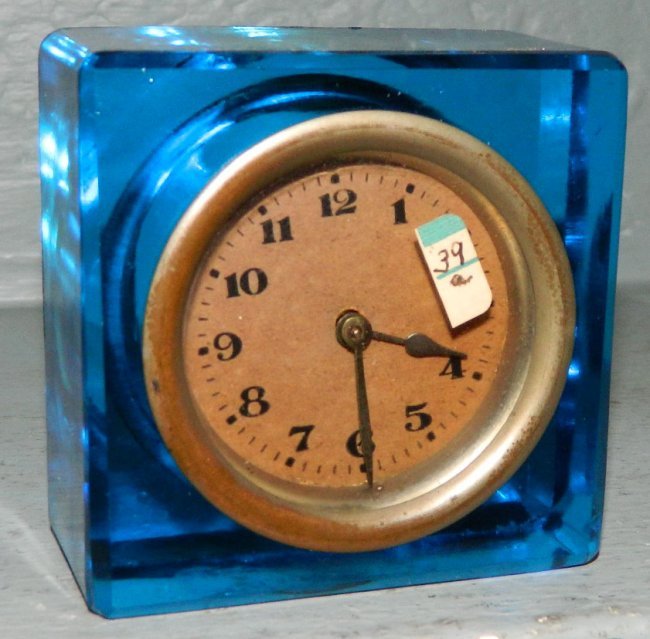 One day flow blue square clock. 3″ square.