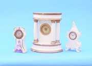 Three Small German Porcelain Mantel Clocks