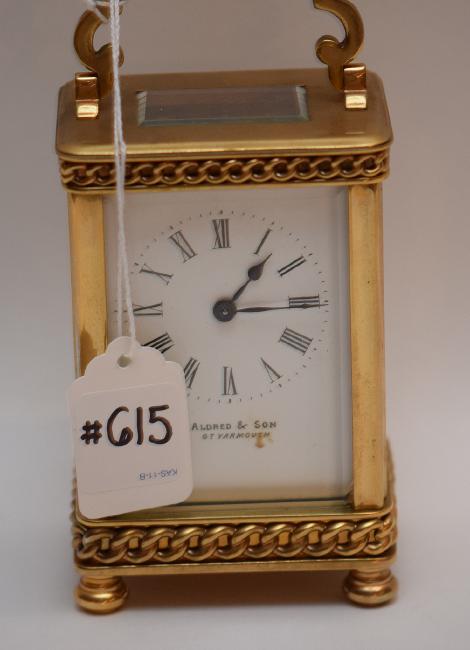 French Brass Carriage Clock with swing handle.  The