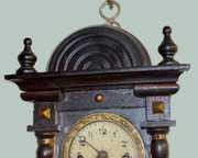 Miniature Carved RA Wall Clock