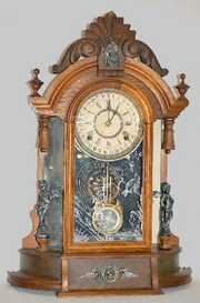 Ansonia Walnut “Triumph” Calendar Clock