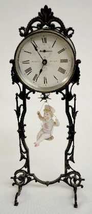 Ansonia “Bobbing Doll” Metal Clock