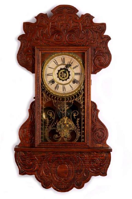 A WATERBURY HANGING GINGERBREAD KITCHEN CLOCK