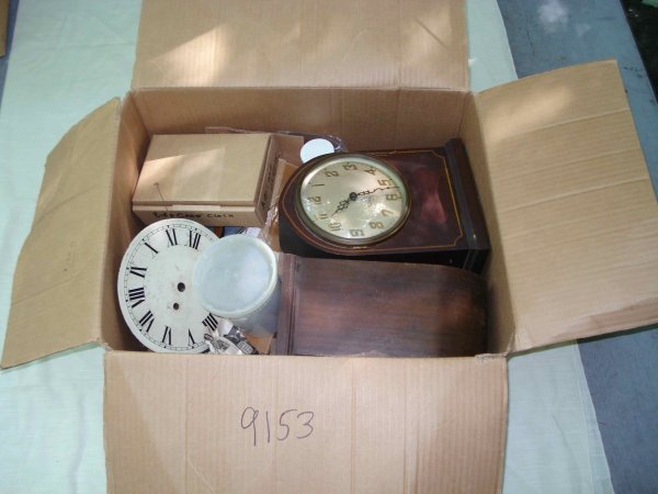 Large box of clock parts