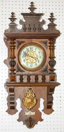 German Carved Free Swinger Wall Clock