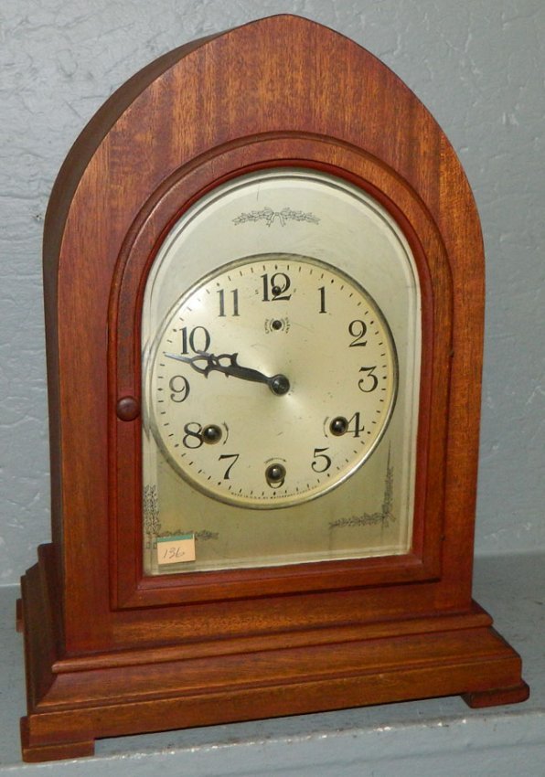 Waterbury 8 day chimer clock w/ wooden doors.