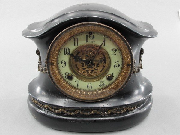 A WATERBURY CLOCK CO CAST IRON MANTEL CLOCK