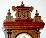 Antique Walnut Carved Free Swinger Clock