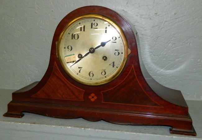 German mahogany inlaid 8 day striker clock.
