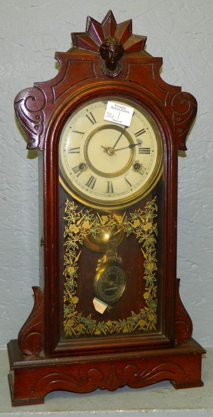 Jerome & Co. Walnut 8 day clock.