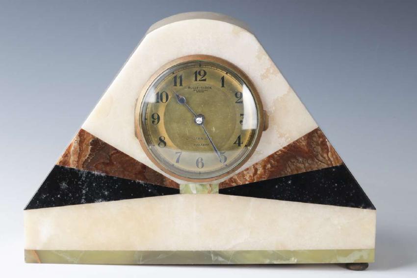 A MARBLE FRENCH ART DECO ELECTRIC BULLE CLOCK