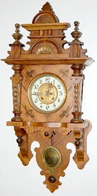 Antique Walnut Free Swinger Wall Clock