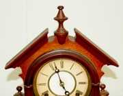 8 Day T & S Parlor Clock W/ Cherub Pendulum