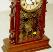 8 Day T & S Parlor Clock W/ Cherub Pendulum