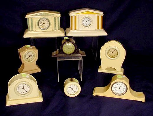 Collection of 8 Celluloid Case Clocks