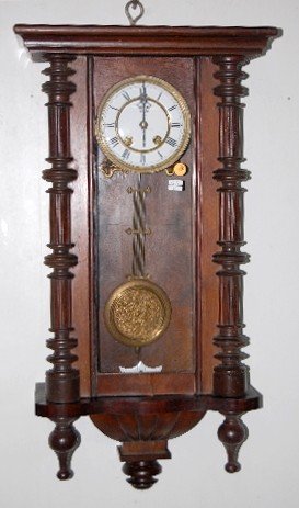 Carved RA Wall Hanging Clock