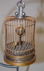 Japan Animated Bird in Cage Clock