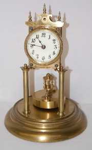 Urania Germany Disk Pendulum Dome Clock