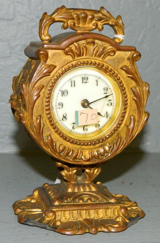 Gilt decorated Jennings Brothers clock.