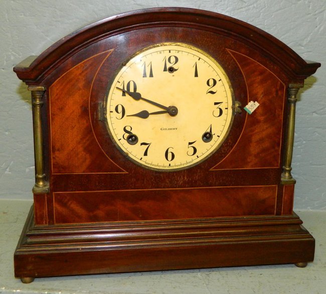 Inlaid mahogany shelf clock.
