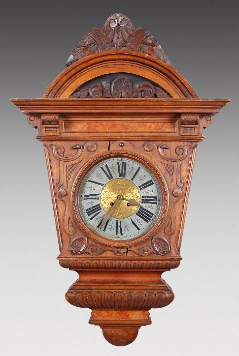 Carved Gustav Becker walnut wall clock,