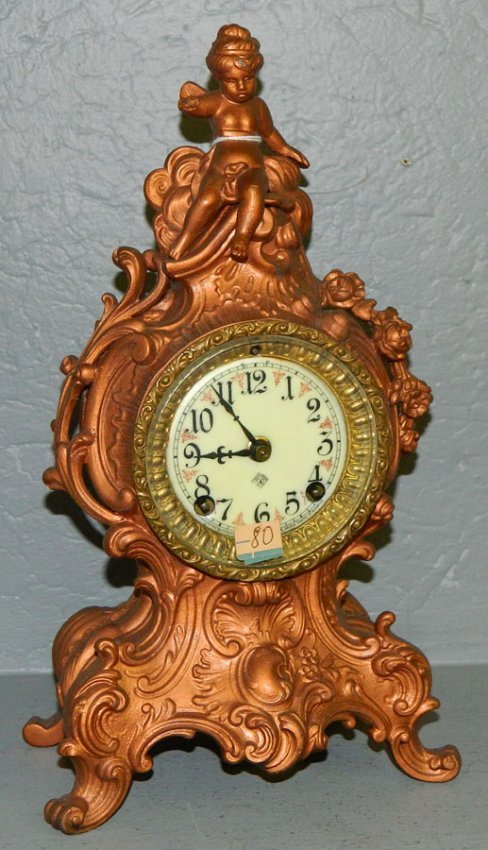 8 day Ansonia bronze & boulle clock w/cherubs.