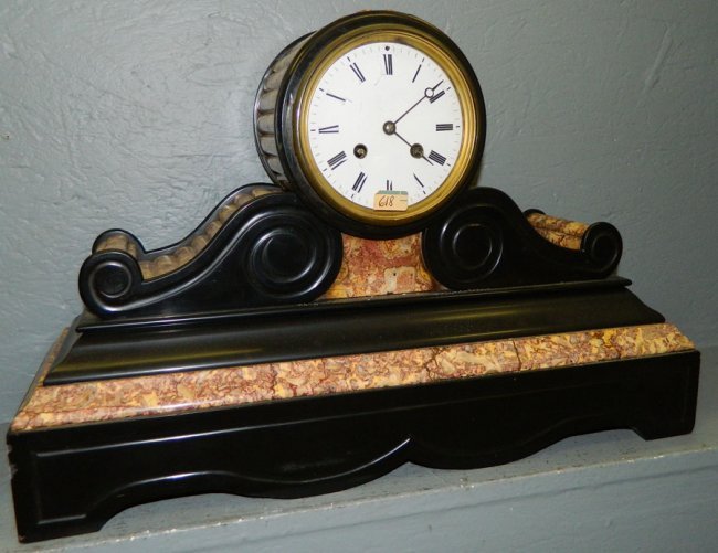 8 day French marble clock with porcelain dial.