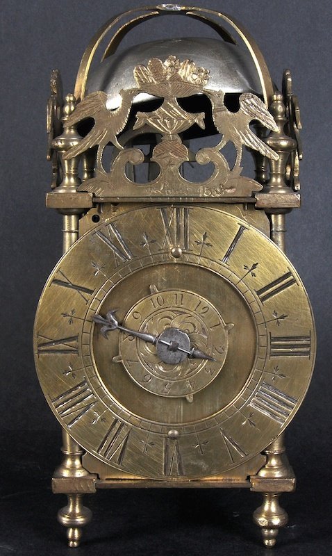 A SMALL 17TH CENTURY BRASS LANTERN CLOCK, by T. LOUIS,