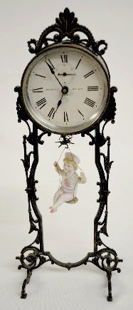 Ansonia “Bobbing Doll” Metal Clock