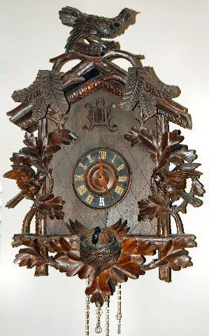 Black Forest Carved Bird Cuckoo Clock