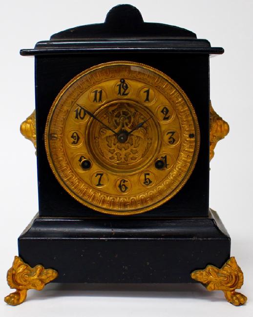 Late 19th century Iron Case mantel clock by Waterbury Clock Co