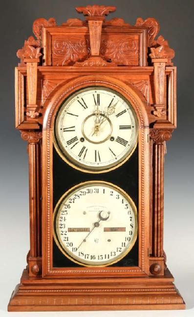 WATERBURY NO. 43 WALNUT DOUBLE DIAL CALENDAR CLOCK