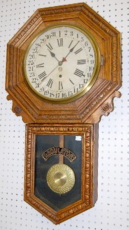 New Haven Carved Oak Calendar Schoolhouse Clock