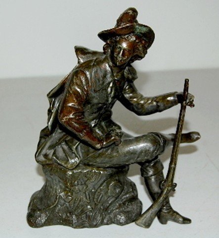Hunter Seated On A Stump Metal Clock Statue