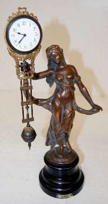 Lady Figural Swinger Clock