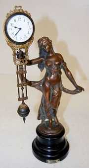 Lady Figural Swinger Clock